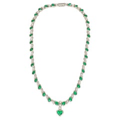 Collar de diamantes esmeralda de 18 quilates en forma de corazón con certificado GIA de 33 quilates