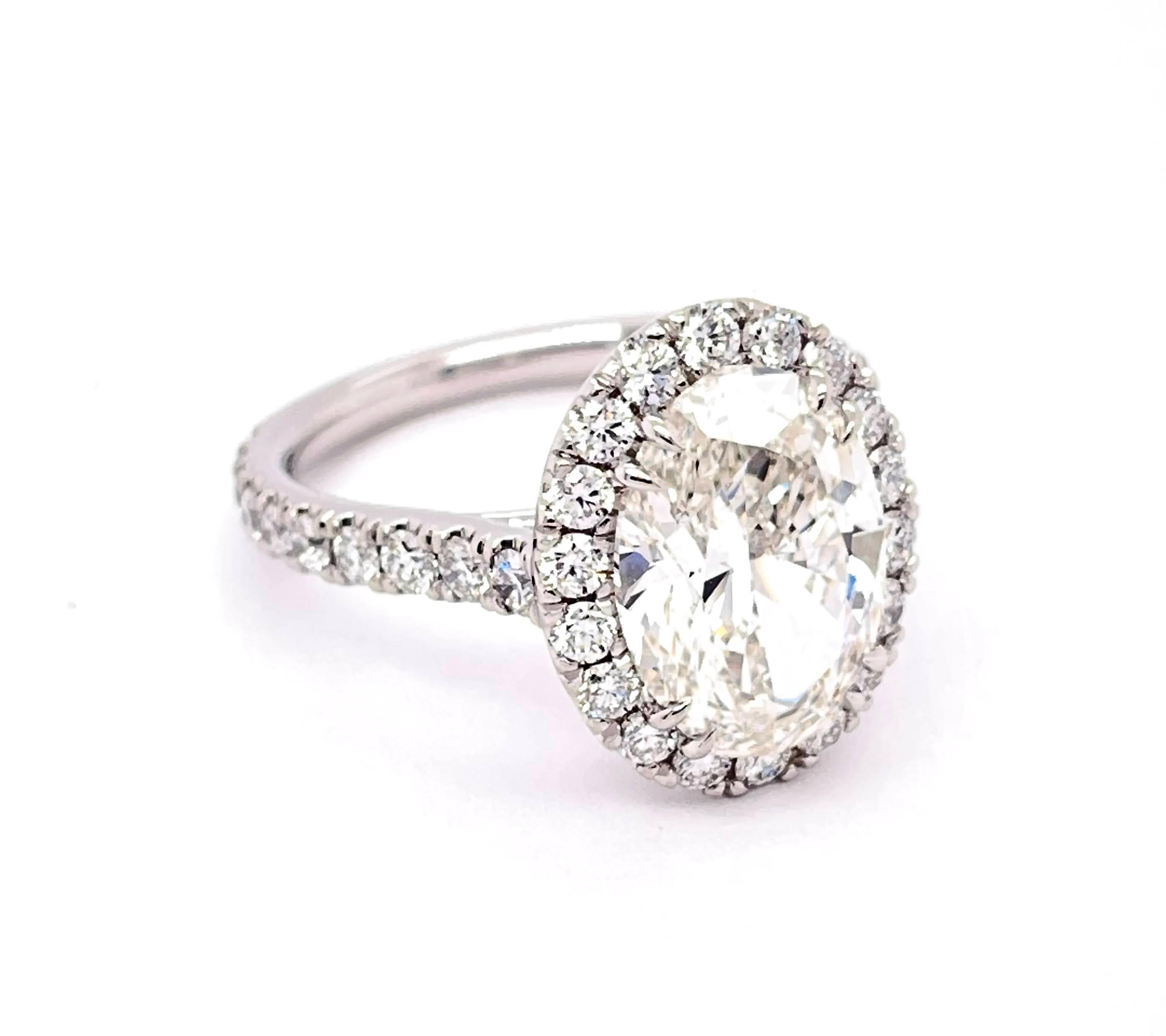 GIA Certified 3.30 Carat Oval Diamond Engagement Ring Platinum Mounting 1
