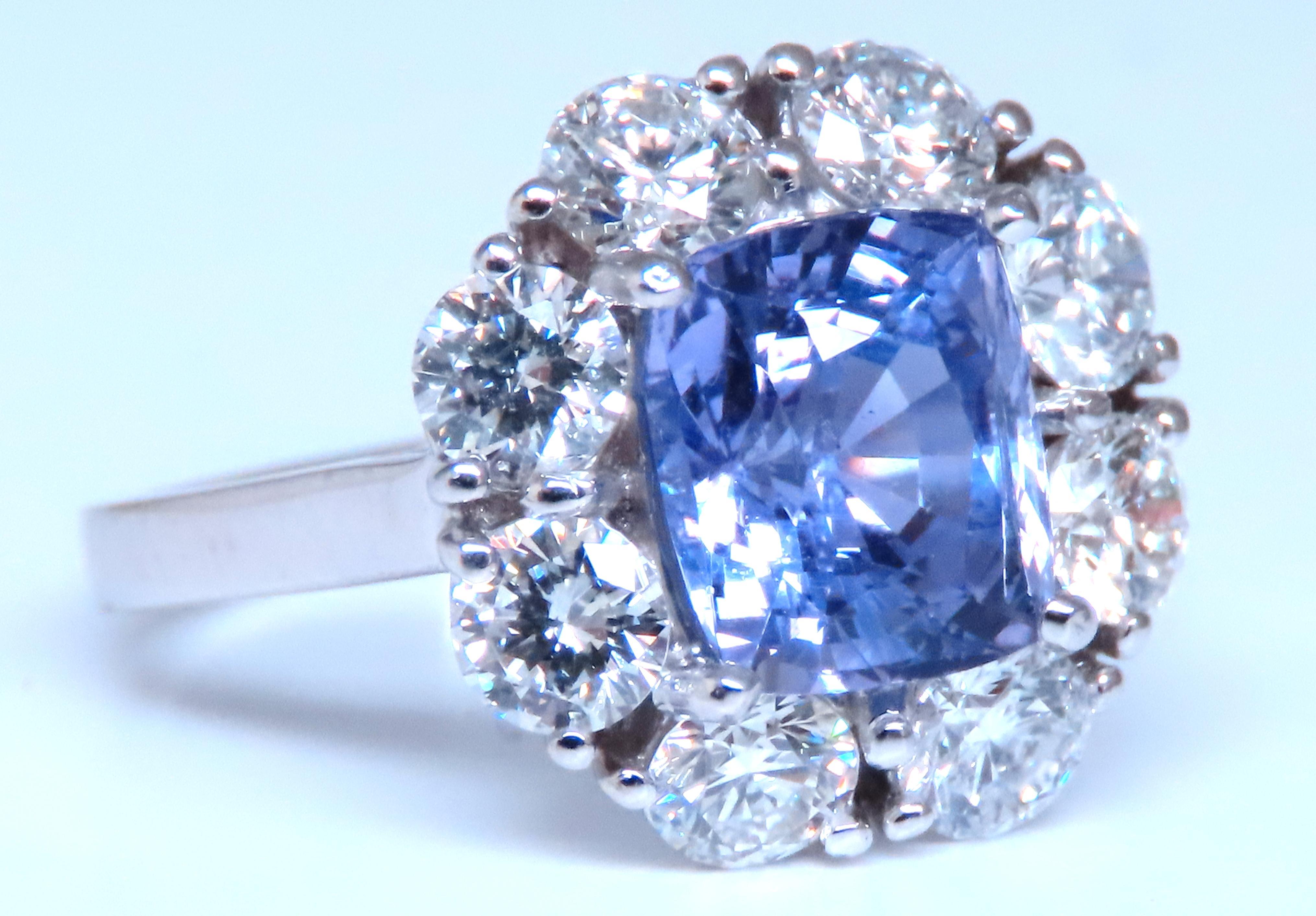 GIA Certified Natural Sapphire Ring
Report 2201858090
8.26 x 7.11 x 5.96mm
Transparent, No Heat
Violet changing to pinkish purple
1.75ct Natural Round Diamonds
G-H color vs-2 clarity
18kt white gold.
Deck of Ring: 14 x 14mm
Depth: 7mm
Size
