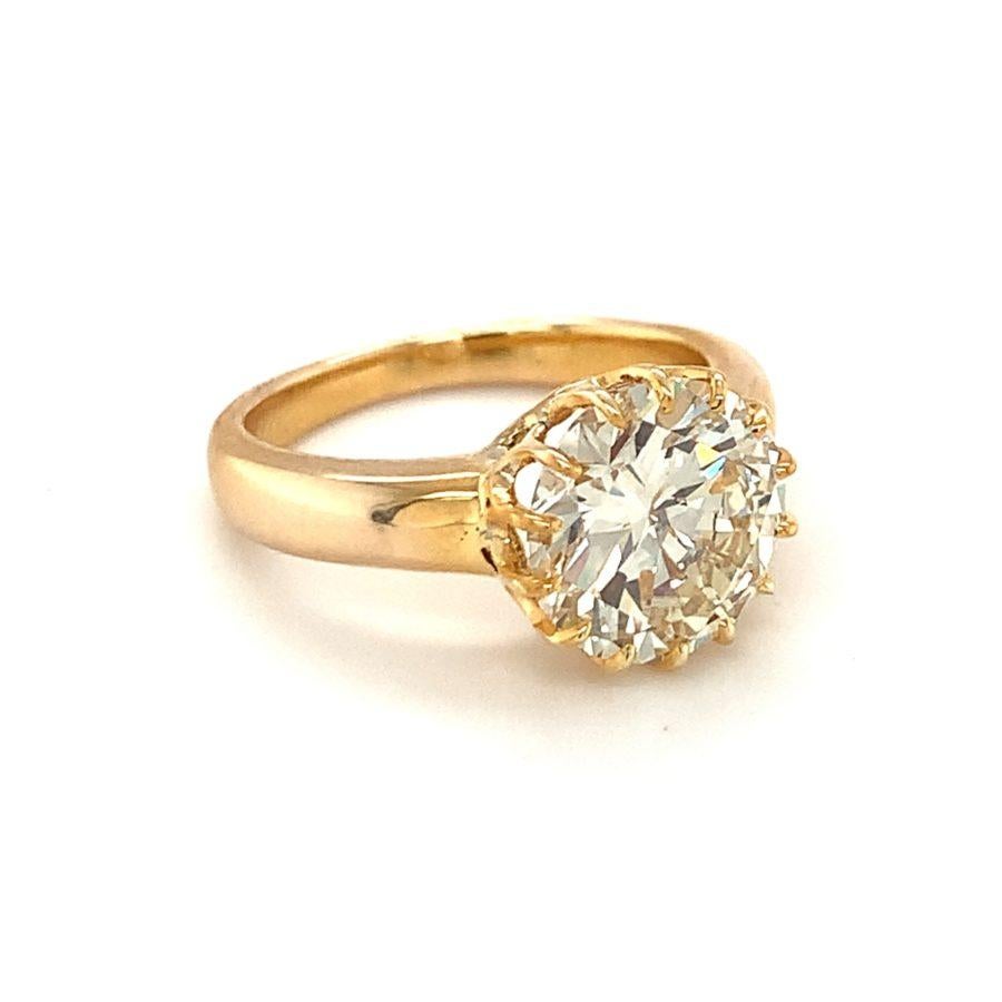 One GIA certified 3.32 ct. diamond engagement ring in 14K yellow gold featuring an antique style claw mount. Centering one round brilliant cut diamond weighing 3.32 ct. with GIA Report No. 2211777954 – O-P color and VS-1 clarity. Breathtaking,
