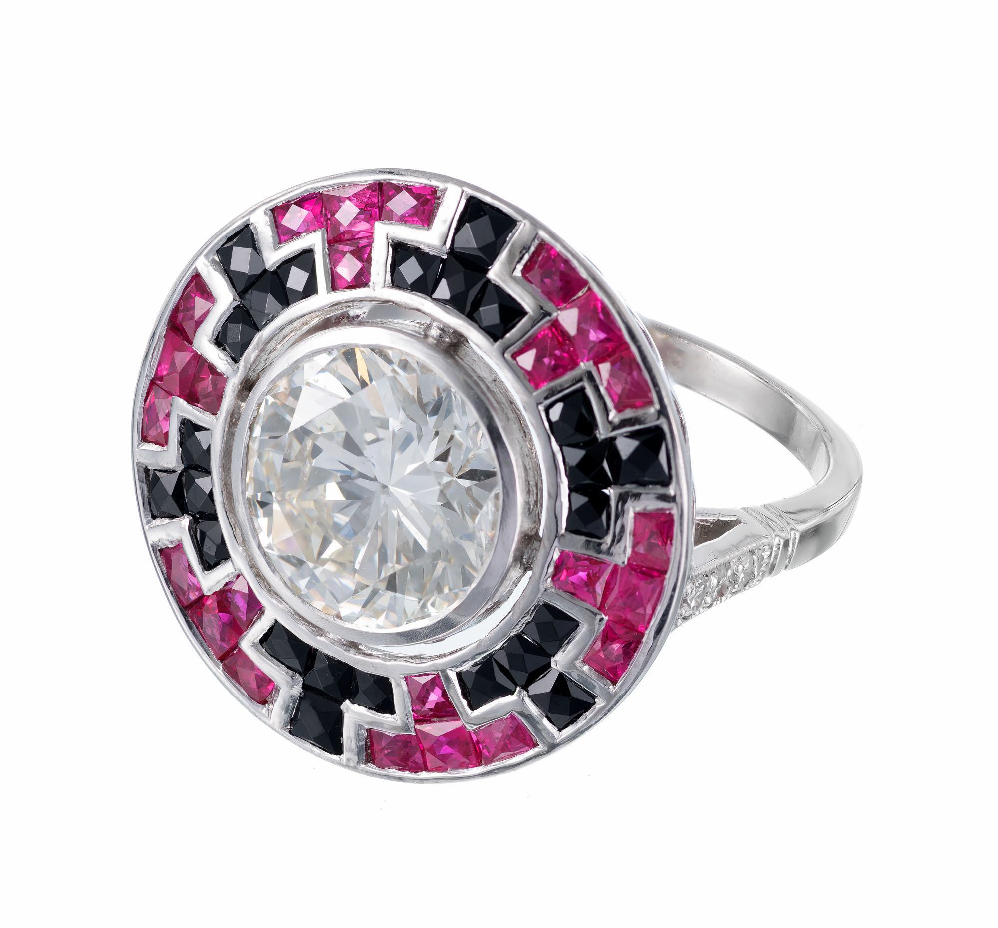 Diamond with French cut ruby and black onyx cocktail ring. Art deco inspired custom made mounting set with brightly colored rubies and onyx in a mosaic halo pattern. 3.34 carat transitional cut bezel set center stone. 

1 round brilliant cut diamond