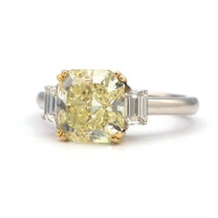 GIA Certified 3.34 Carat Radiant Cut Natural Yellow Diamond Ring