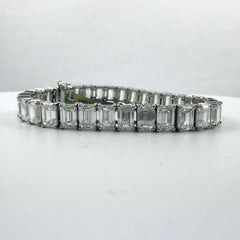 GIA Certified 33.54 Carat Emerald Cut Tennis Bracelet, Platinum, D–F Color
