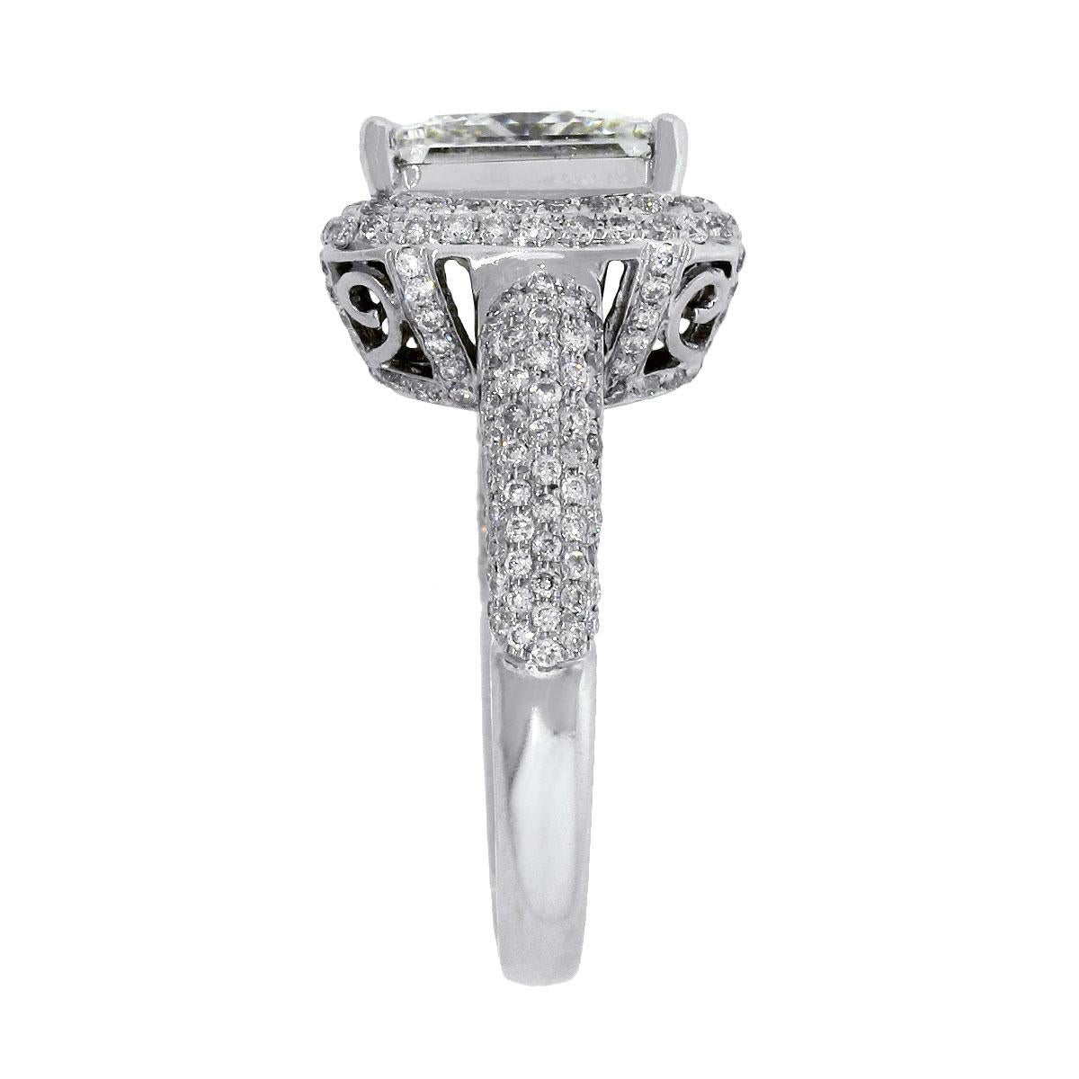 Material: 18k White Gold
Main Diamond Details: 3.37ct of Princess Cut Diamond. Diamond is K in color and SI1 in Clarity. GIA #2191329048
Adjacent Diamond Details: Approximately 1.75ctw of Pave Set Princess Cut diamonds. Diamonds are I in color and