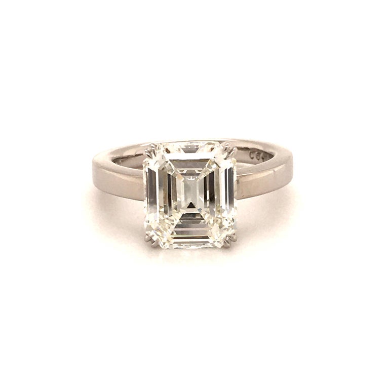 Classic nice solitaire white gold 750 ring. Set in four double prongs with 1 stunning 3.37 ct emerald cut diamond of H-if quality. The diamond is accompanied with a GIA certificate. The stone shows a beautiful layout with a nice built up