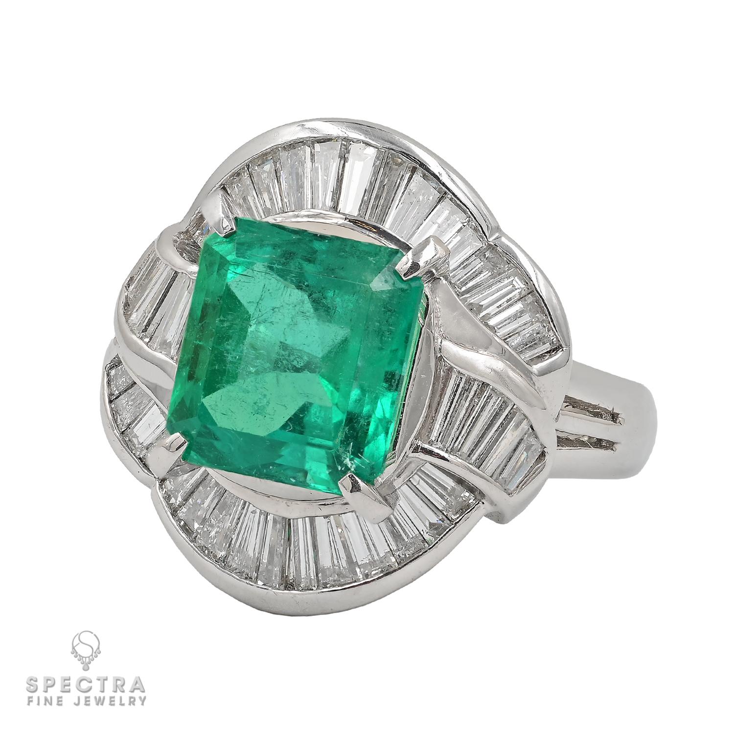 Introducing our exquisite Colombian Emerald Diamond Ring, featuring a stunning 3.38-carat emerald-cut Colombian Emerald, with a moderate color enhancement, certified by GIA for authenticity and quality assurance.

This captivating ring is adorned