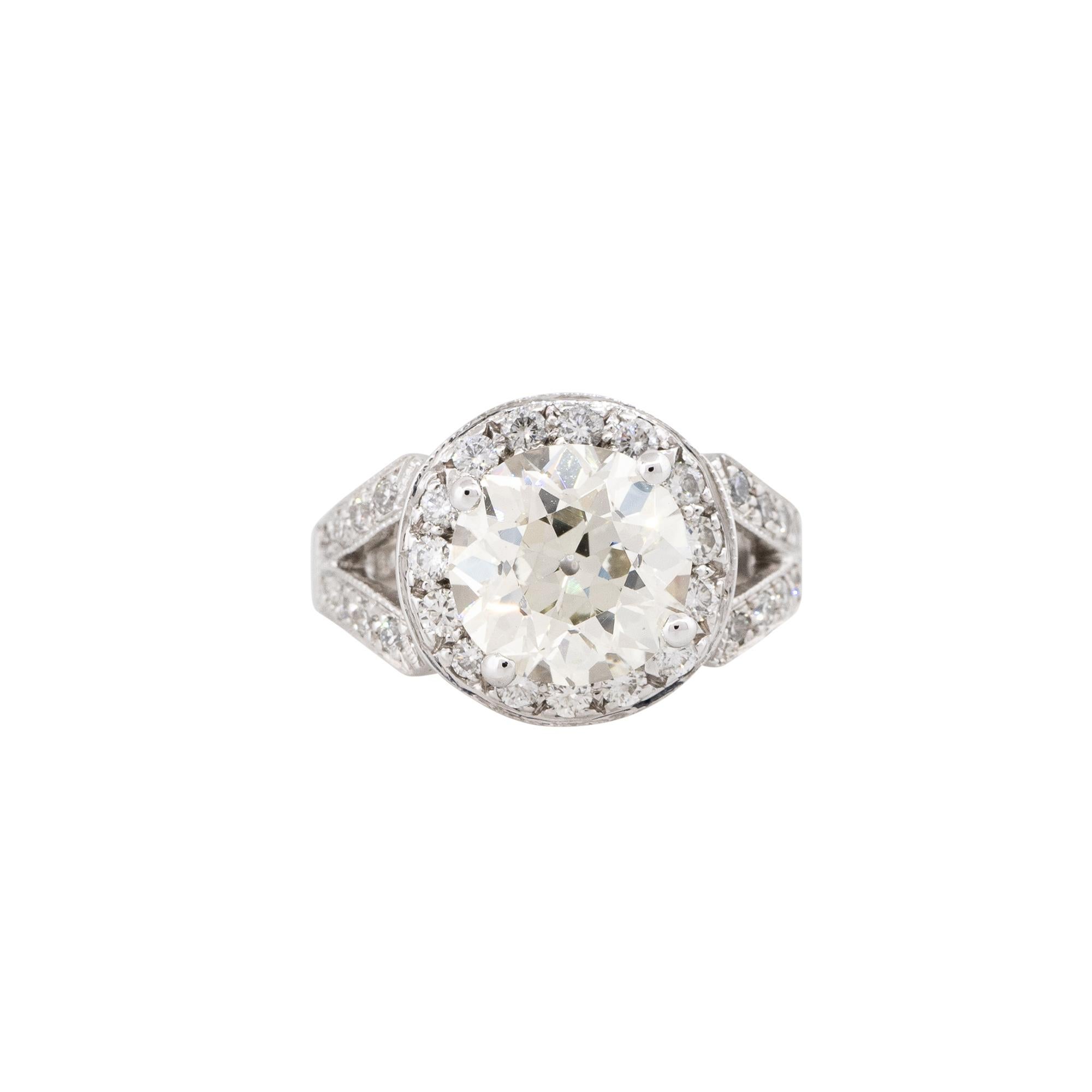GIA Certified 18k White Gold 3.38ctw Circular Brilliant Diamond Halo Engagement Ring

This GIA certified 3.38 carat diamond halo engagement ring is timeless and elegant. The centerpiece of the ring is a circular brilliant cut diamond, weighing in at