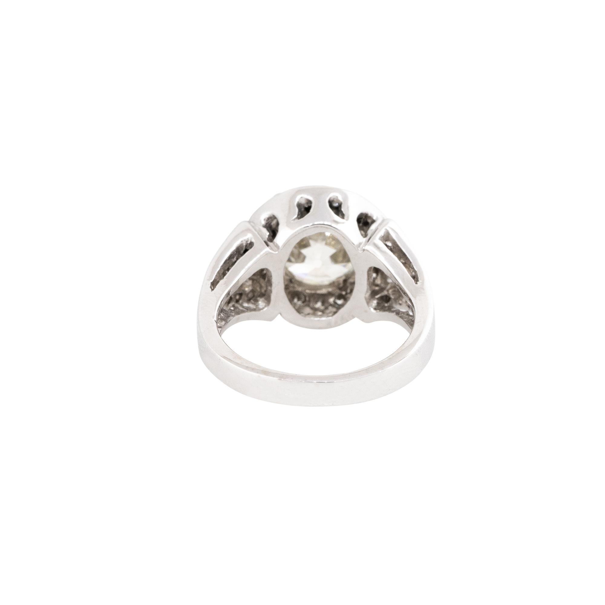 Women's GIA Certified 3.38 Carat Diamond Halo Engagement Ring 18 Karat in Stock For Sale