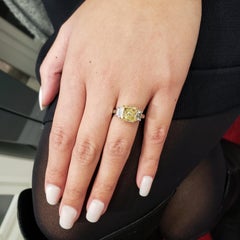 GIA Certified 3.39 Carats Radiant Cut Yellow Diamond Three-Stone Engagement Ring