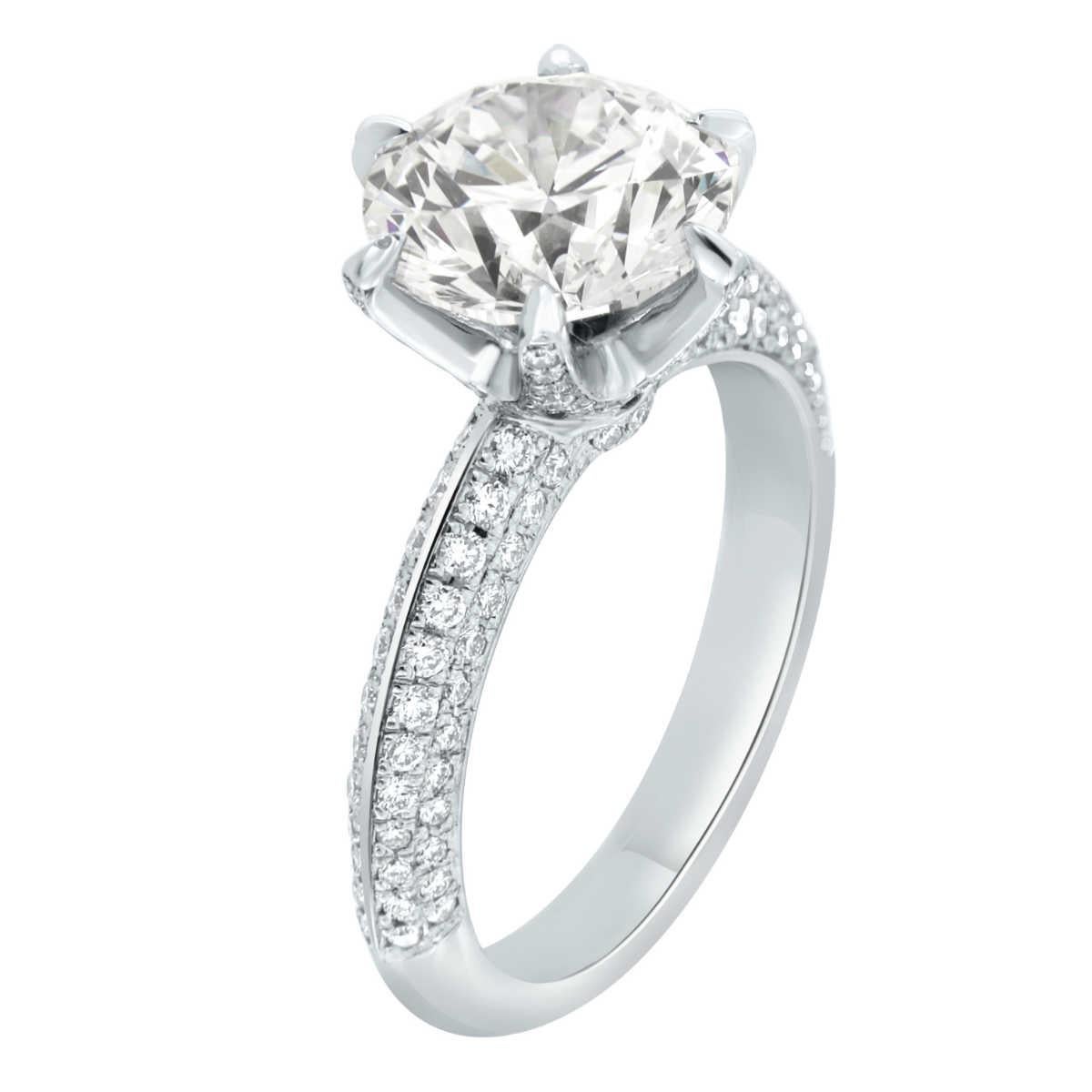 This stunning hand-crafted ring features an ideal cut GIA certified 3.39 carat round diamond D color VVS1 in clarity with six (6) Claw prongs set on a shaped edge diamond band. Each one of the six prongs features a hidden diamond micro prong set.