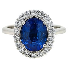 Bague en or blanc certifiée GIA de 3.39 carat de saphir et de diamant rond