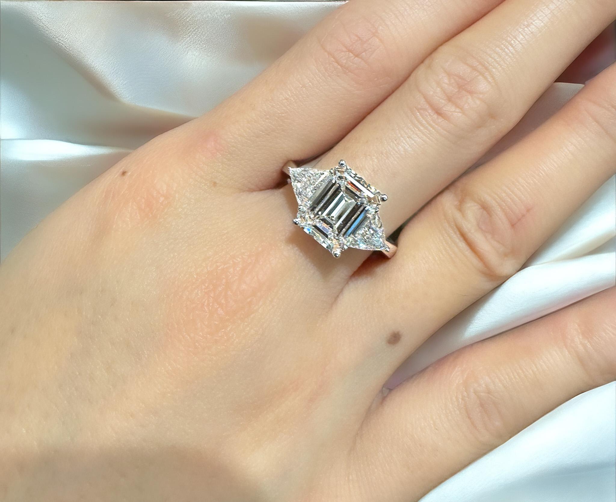 Women's GIA Certified 3.45 Carat F/VVS2 Emerald Cut Diamond Engagement 3 Stone Ring For Sale