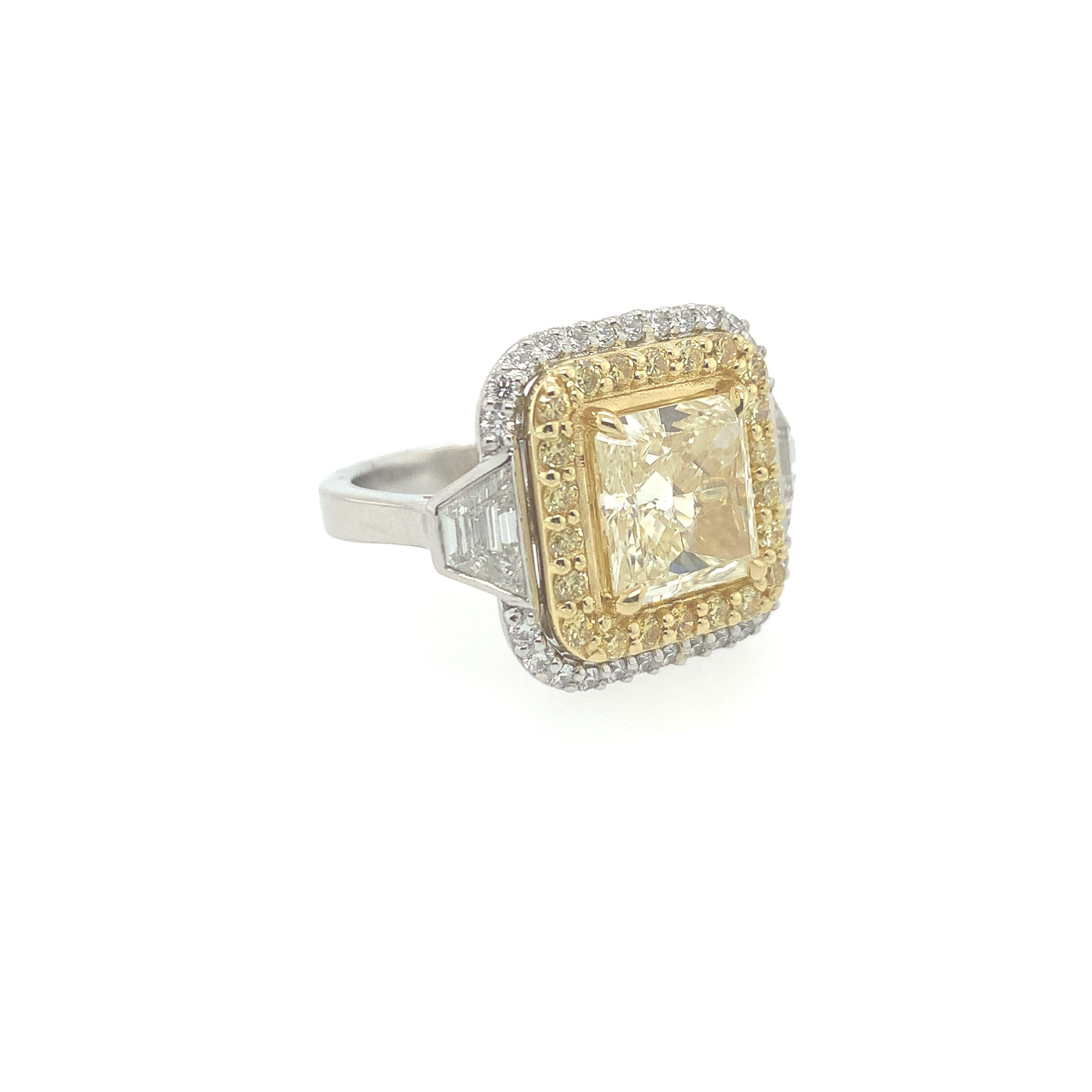 Modern GIA Certified 3.46 Carat Fancy Yellow and Diamond Ring For Sale