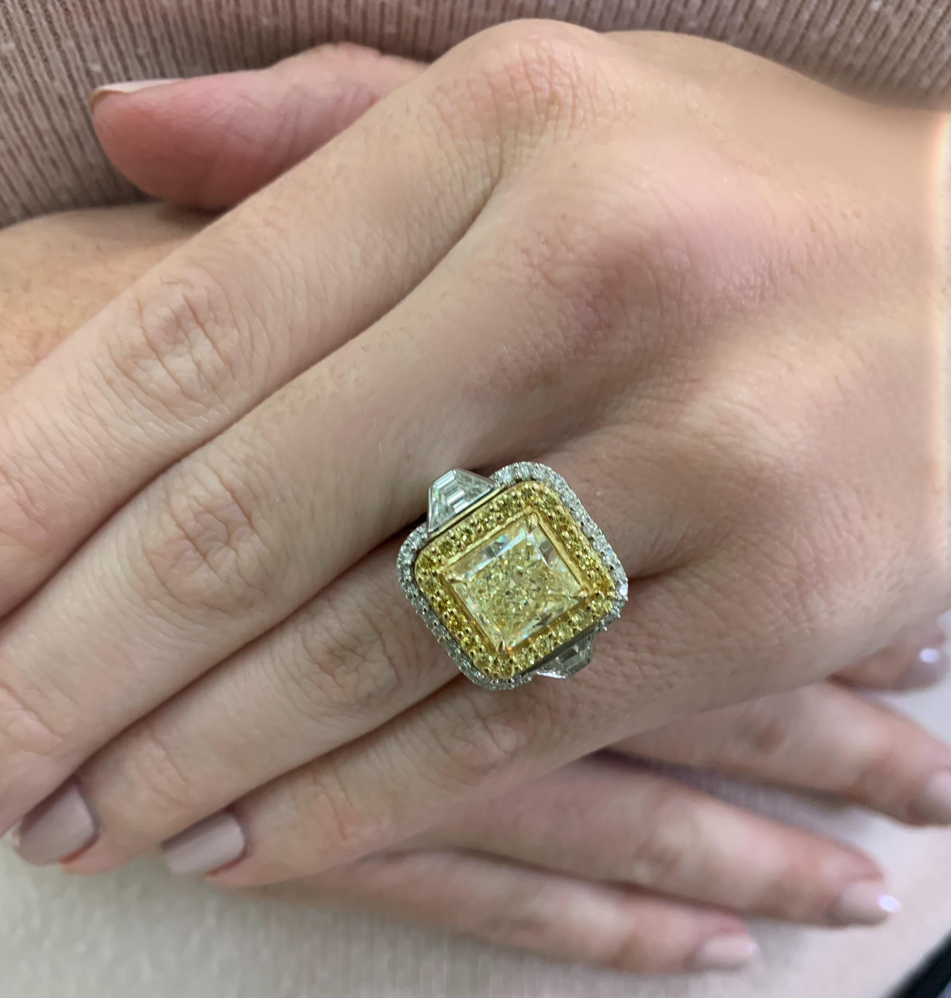 Radiant Cut GIA Certified 3.46 Carat Fancy Yellow and Diamond Ring For Sale