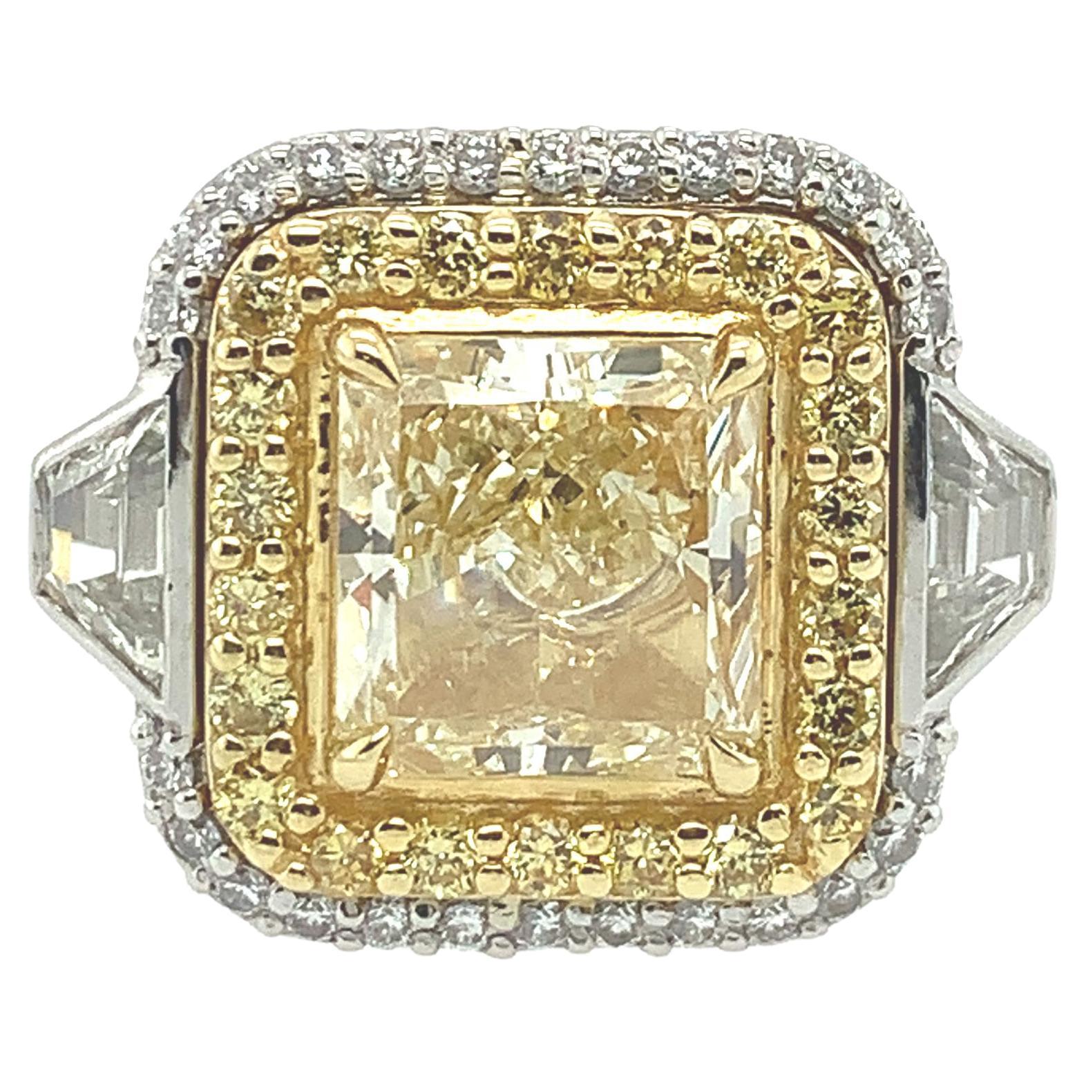 GIA Certified 3.46 Carat Fancy Yellow and Diamond Ring For Sale