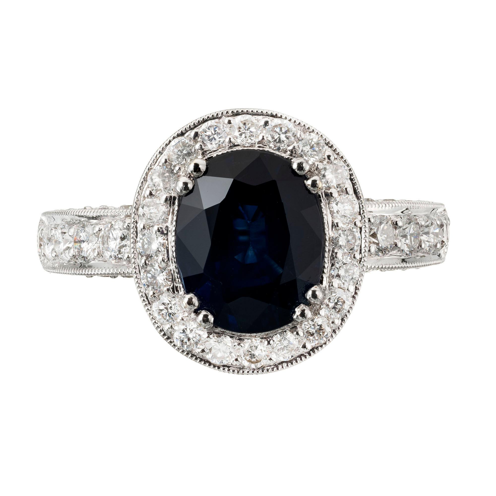 Oval Royal blue Sapphire diamond halo engagement ring. Oval natural sapphire center stone, GIA certified, with a halo of bright white brilliant diamonds. 

1 oval blue natural Sapphire approx. total weight 3.48cts,GIA certificate #1176784762
49