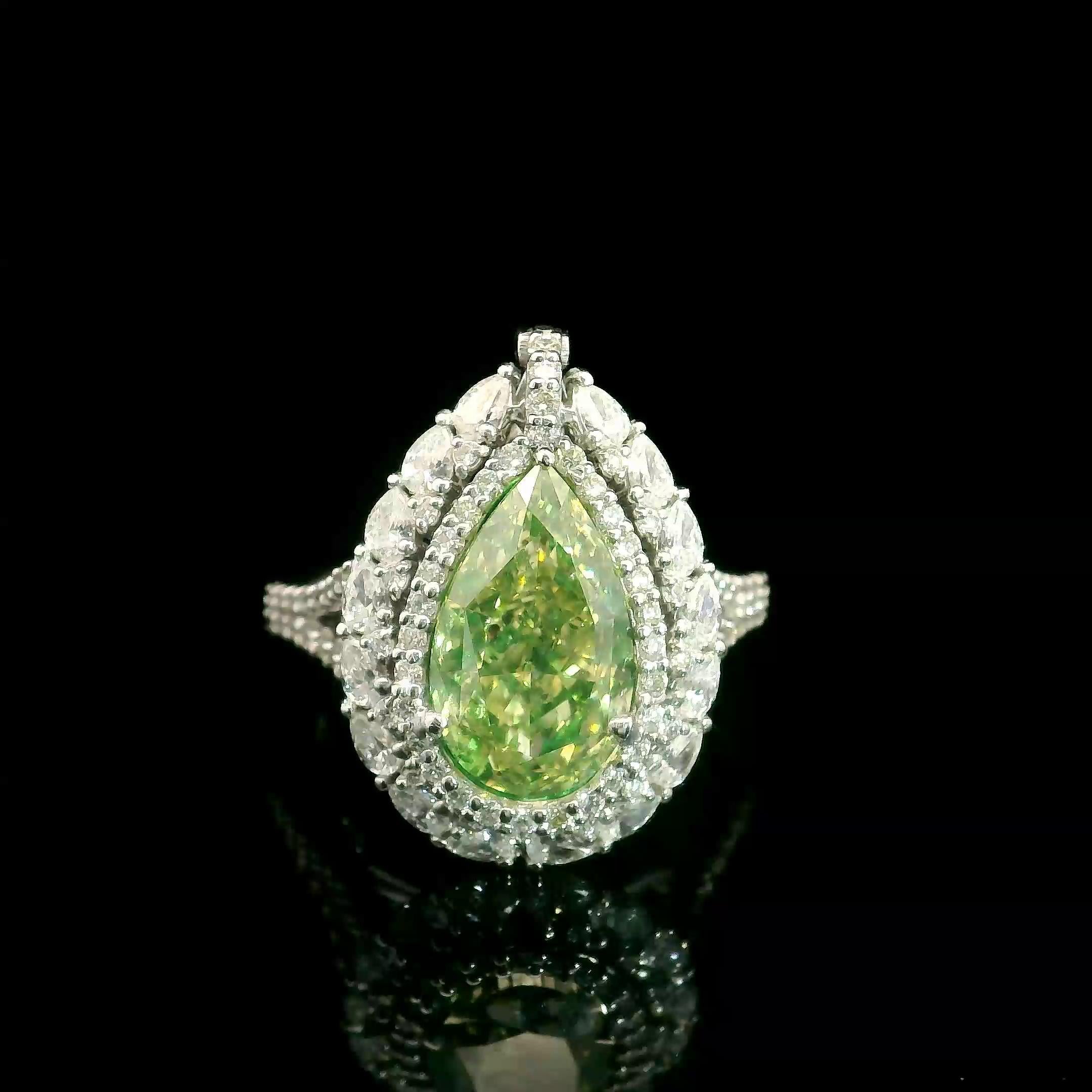 Anello in oro bianco 18 carati (convertibile) con diamanti
  
  Colore e caratura dell'oro: Oro bianco 18kt
  Peso: 8,674 grammi
  
  Imposta con...
  Tipo di pietra: Diamanti
  Forma: A pera
  Carati: 3,50 ct
  Colore: Giallo bruno-verdastro 
 