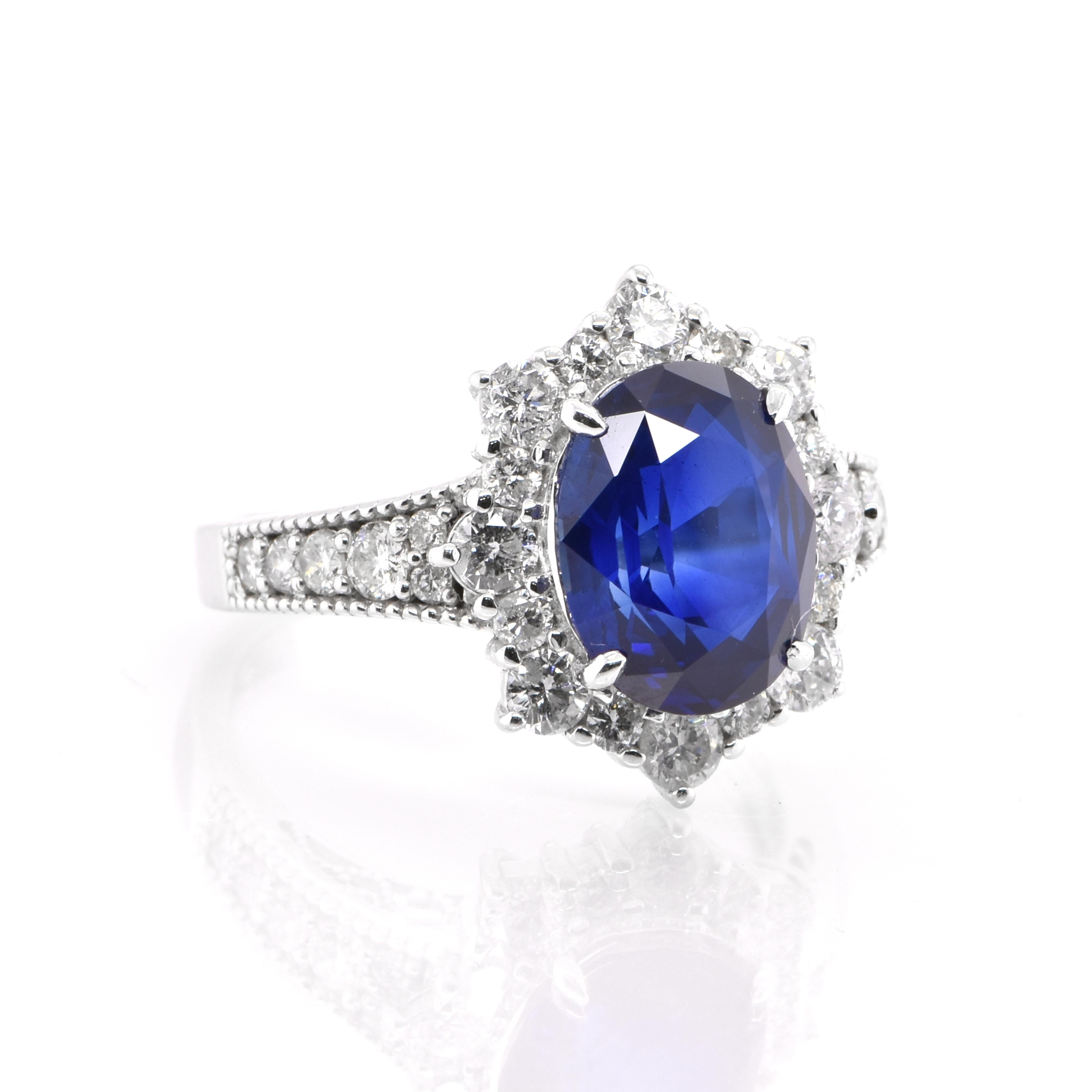 Modern GIA Certified 3.50 Carat Natural Blue Sapphire and Diamond Ring Set in Platinum For Sale
