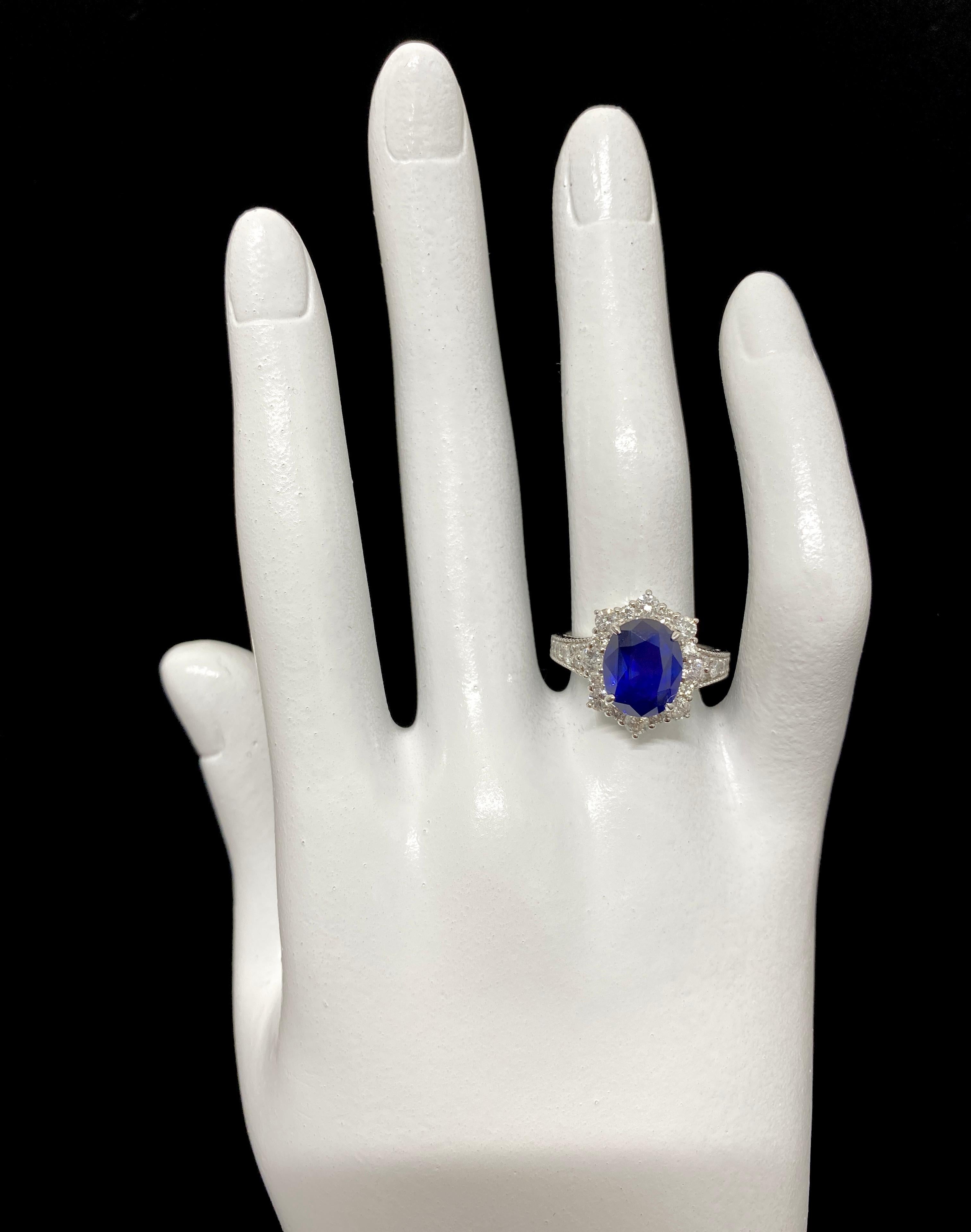 Women's GIA Certified 3.50 Carat Natural Blue Sapphire and Diamond Ring Set in Platinum For Sale