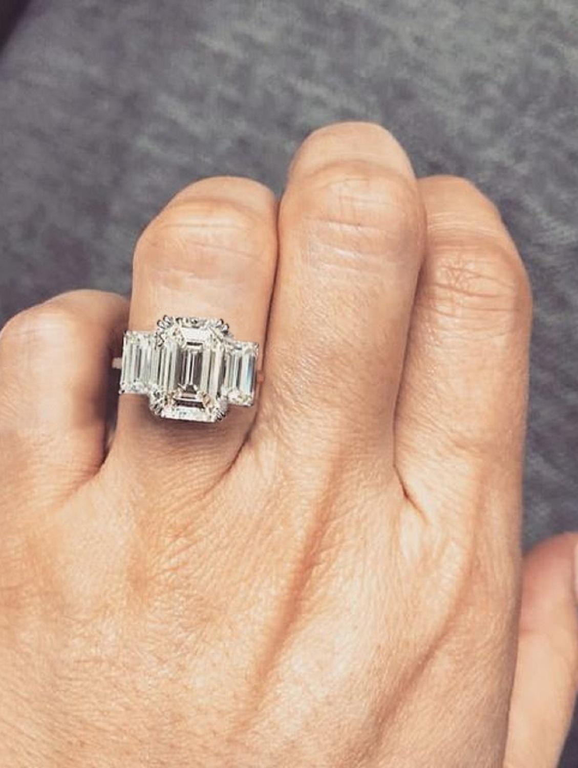 GIA Certified 2.50 Carat Three Stone Emerald Cut Diamond Platinum Ring 
Internally flawless clarity

The side diamonds weight approximately 0.75 carat in total