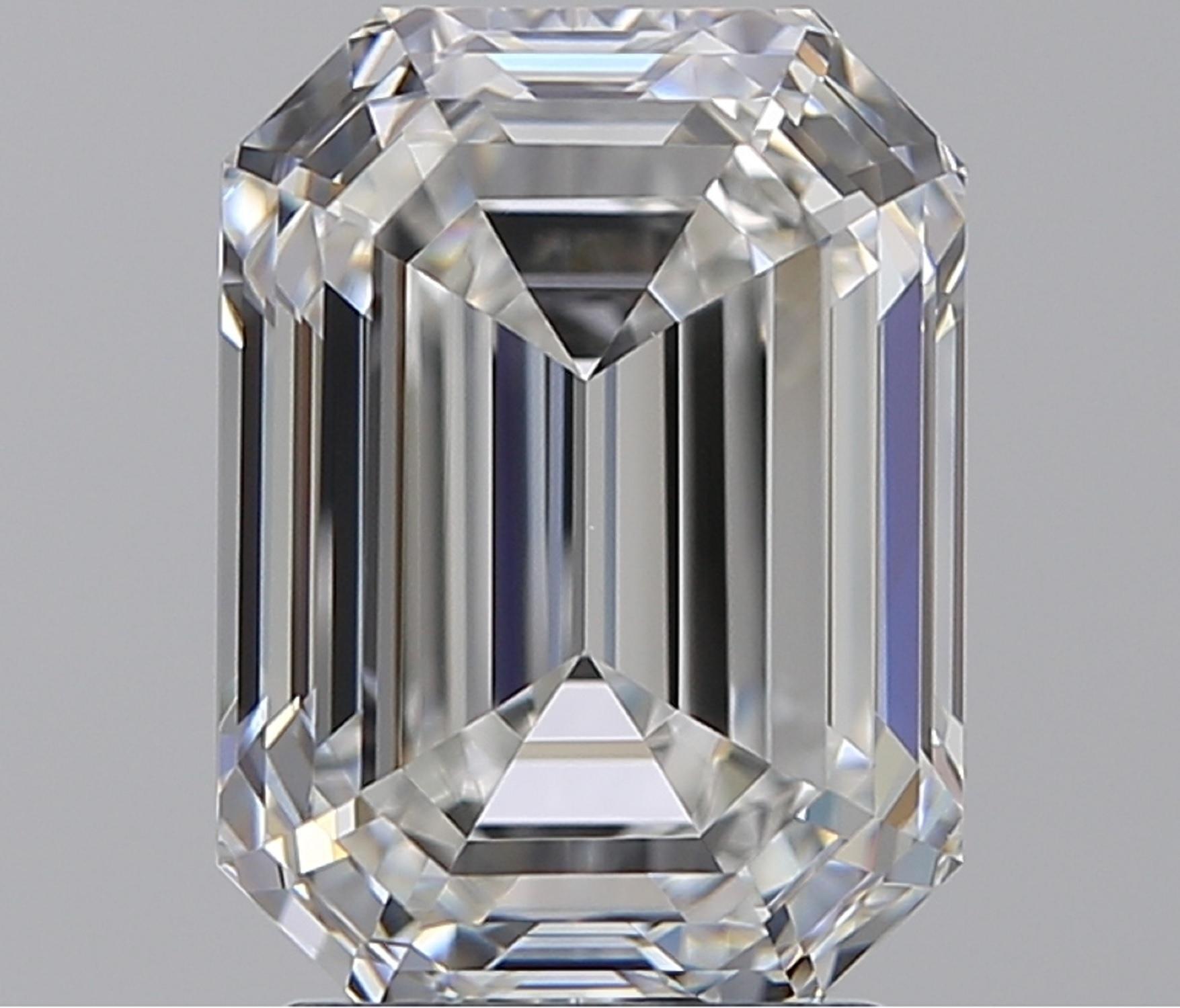 3 stone emerald cut diamond ring