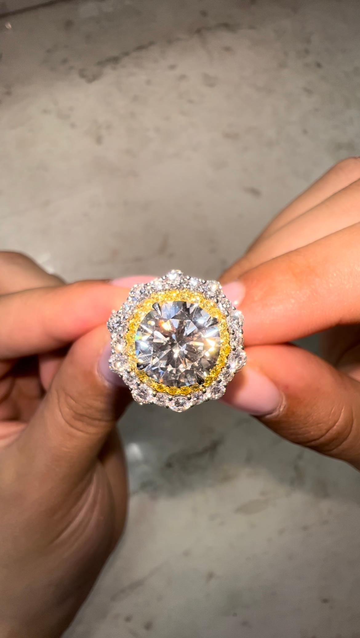 Handmade
18K White Gold
Center Stone is 3.50ct KVVS1 GIA Certified
5.03ct Total Diamond Weight
Signature Sunflower Design
Designed, Handpicked, & Manufactured From Scratch In Los Angeles Using Only The Finest Materials and Workmanship