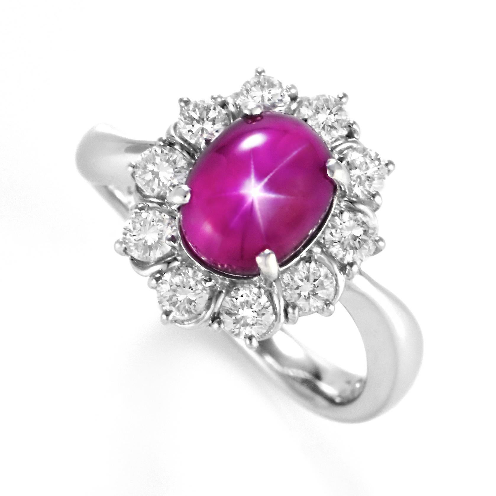 A beautiful Ring made in Platinum featuring a GIA certified 3.512 Carat Natural Burmese Star Ruby and 0.66 Carat Diamonds. Rubies are referred to as 