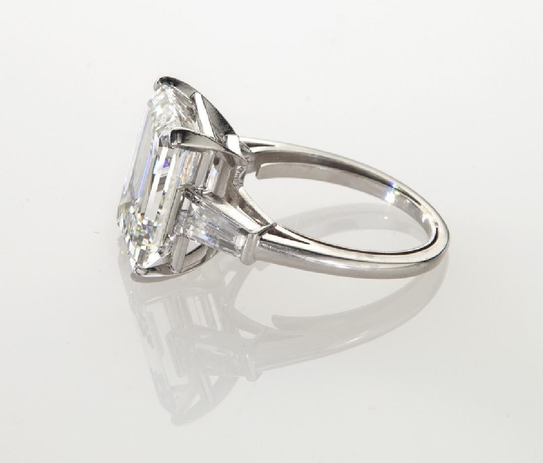 This gorgeous 4.01 Carat GIA certified emerald cut diamond ring is completely eye clean, bright white, and it sparkles stunningly with vibrant brilliance! 

It is a gorgeously sophisticated cut that offers bright and lively sparkle and exceptional