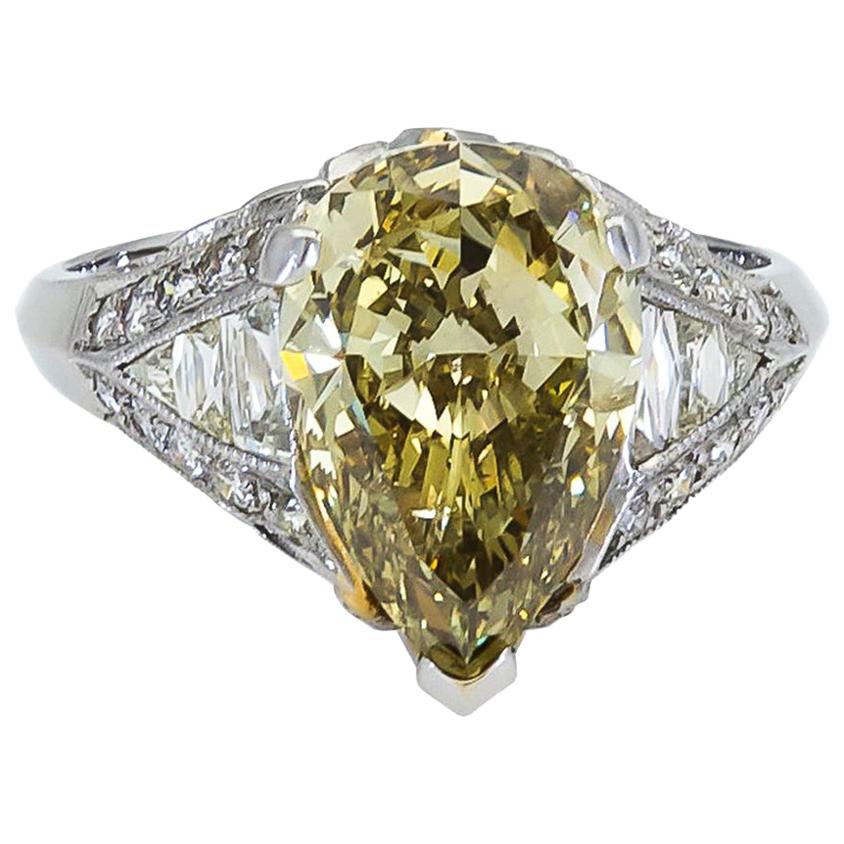 GIA Certified 3.51 Carat Pear Shape Yellow Diamond Engagement Ring For Sale