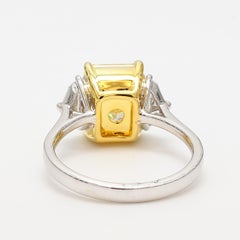 GIA Certified 3.51 Carat Yellow Radiant Cut Center with Two White Half Moons