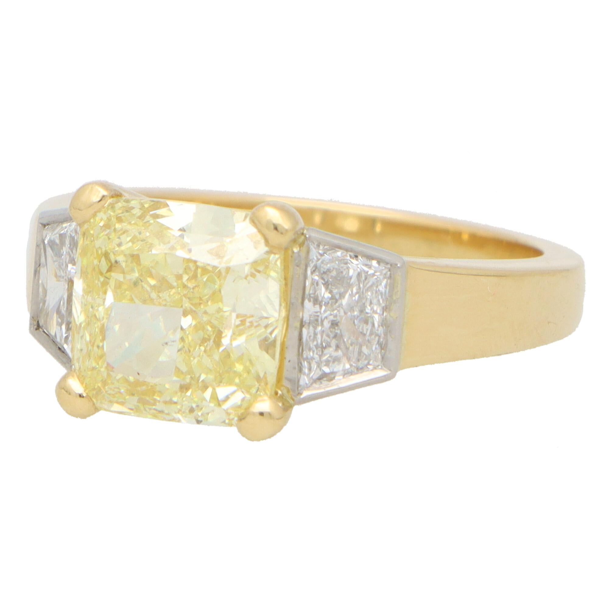 Modern GIA Certified 3.51ct Fancy Yellow Diamond Three Stone Ring Set in 18k Gold