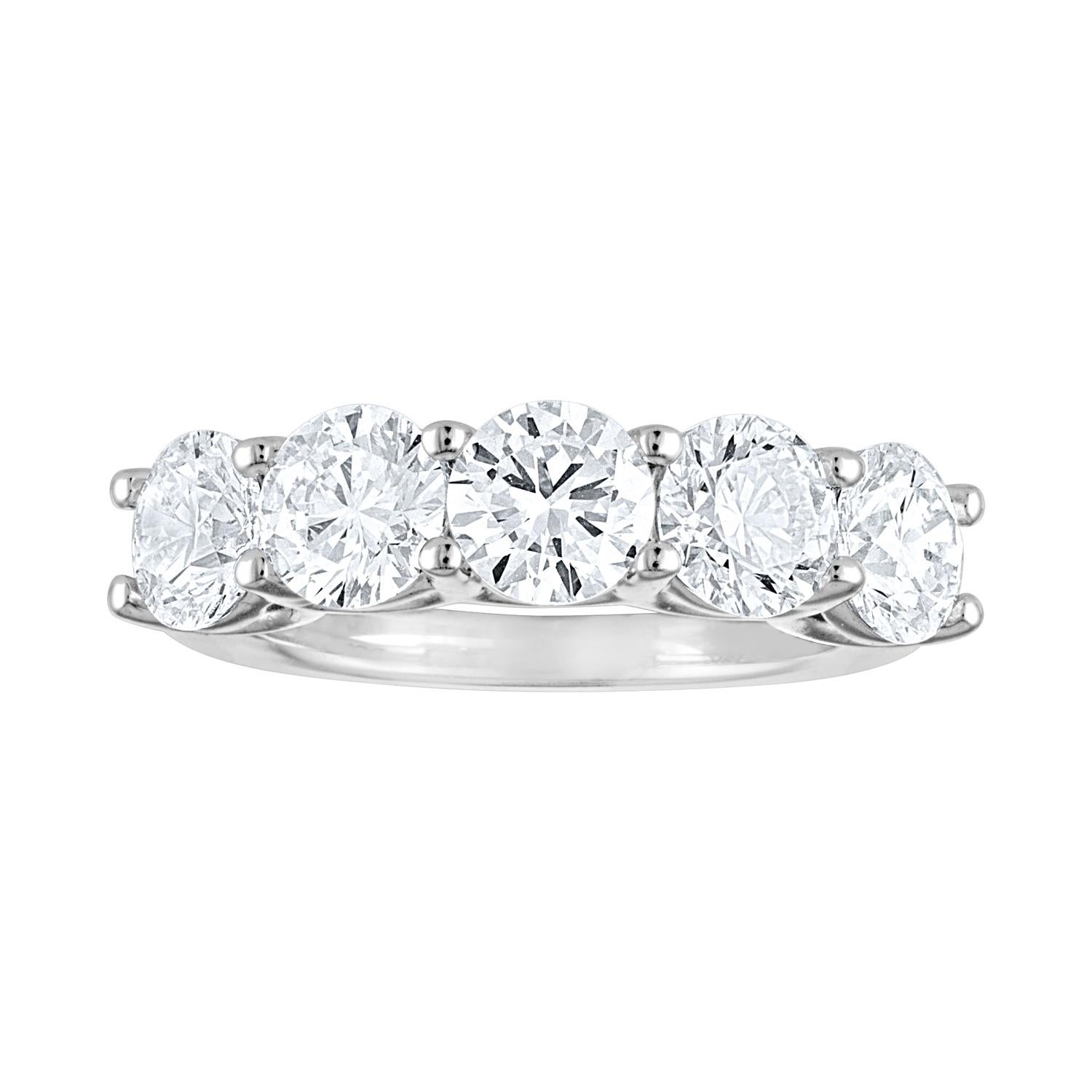 Very Beautiful Half Diamond Band Ring.
The ring is 18K White Gold.
There are 5 Round Cut Diamonds prong set.
Each Stone is GIA Certified
The stones are as follows:
0.70 CT F IF
0.70 CT F VVS1
0.70 CT F VVS1
0.70 CT F VVS2
0.72 CT F VS2
The ring is a