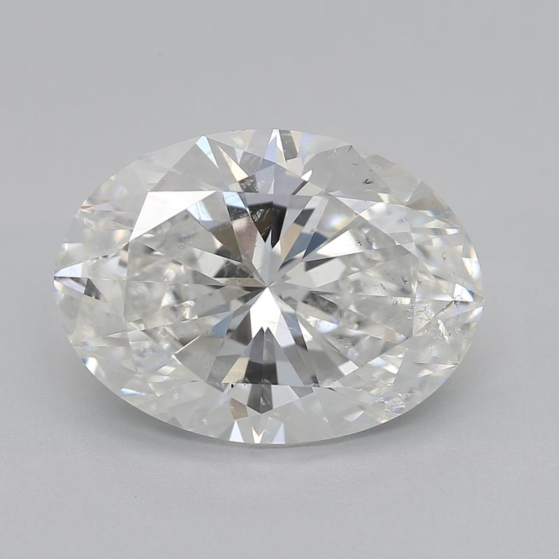 Handcrafted in New York, a captivating diamond ring featuring a stunning centerpiece of a oval diamond weighing 3.52 , set in an elegant yellow gold setting. The diamond boasts an exquisite G and SI2 , offering both remarkable brilliance and