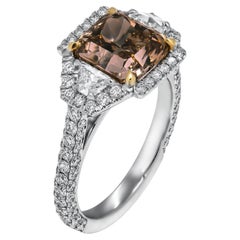 Used GIA Certified 3.52 Carat Natural Fancy Yellow-Brown Radiant Cut Three-Stone Ring