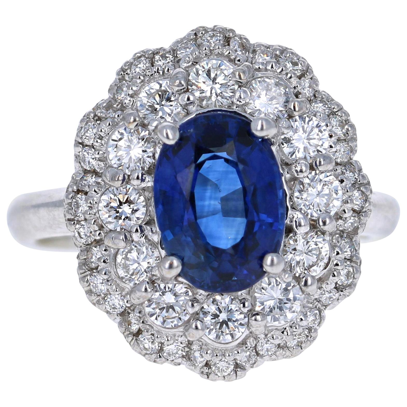 Bague en or blanc 18 carats avec saphir bleu de 3,53 carats et diamants certifiés GIA en vente