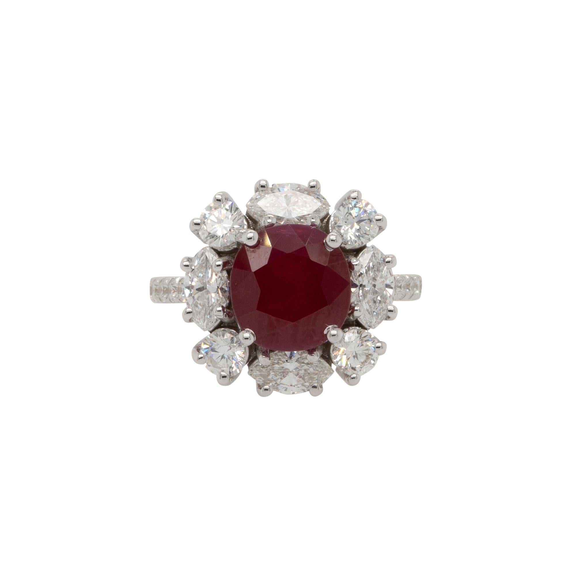 Center Details: 3.53ct Natural Oval Cut Ruby gemstone

Measurements: 9.35 x 8.87 x 4.73 mm

Ring Material: 18k white gold

Ring Details: White gold mounting featuring 1.95ctw of round and marquise cut diamonds. Diamonds are G/H in color and VS in