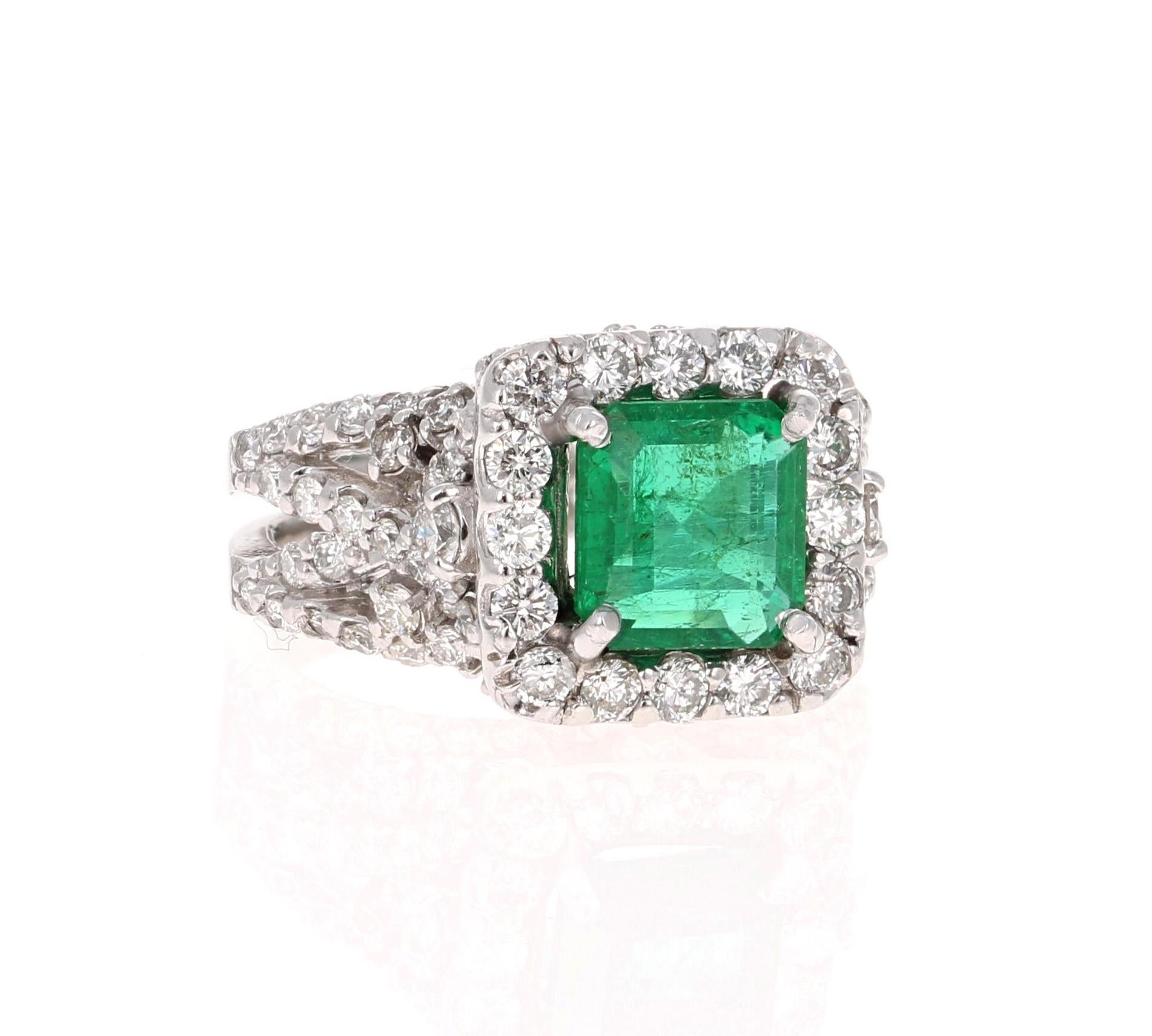 A beautiful modern classic setting holding a magnificent natural Emerald that weighs 2.02 carats.  This gorgeous ring also has 96 Round Cut Diamonds that weigh 1.52 carats.  The Clarity is SI  and the Color is F.  The total carat weight of the ring