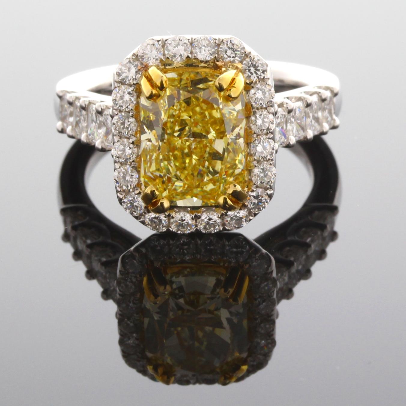 Incredible Deal on GIA Certified 3.55 Carat Elongated Cushion Cut, Natural Fancy Intense Yellow Even, VS2 Clarity, Diamond Ring, measuring 9.98-7.73x5.33. GIA Certificate #5191602263. 
Total Carat Weight on the ring is 4.95. 
This exquisite mounting