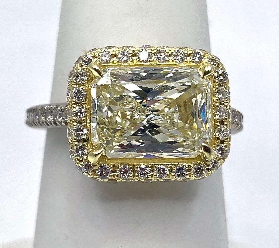 GIA Certified 3.55 Carat Radiant Cut Pale Yellow Diamond Halo Ring For Sale 1