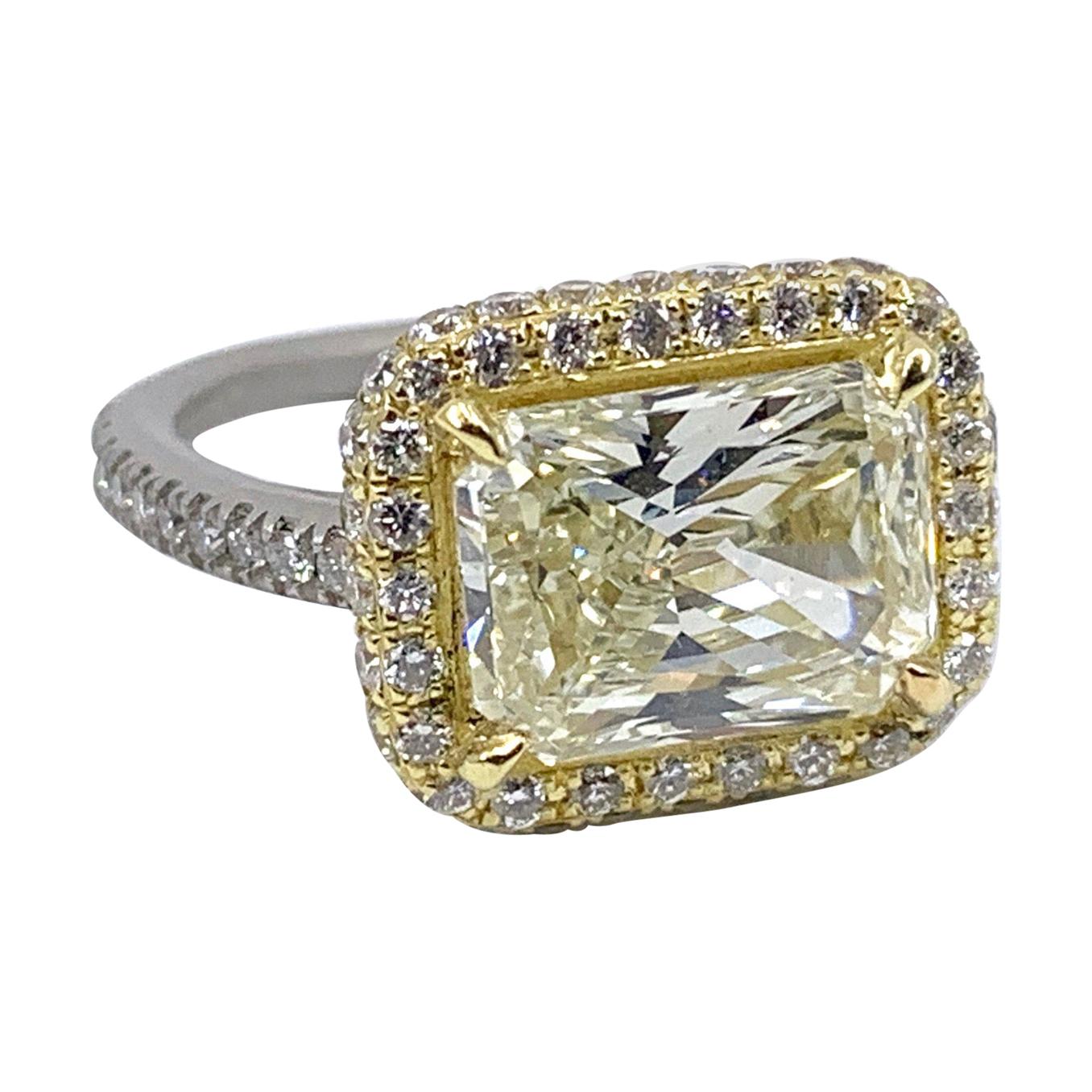 GIA Certified 3.55 Carat Radiant Cut Pale Yellow Diamond Halo Ring