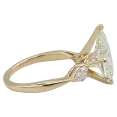 GIA Certified 3.56 Carat Pear Light Yellow VVS2 Natural Diamond Engagement Ring
