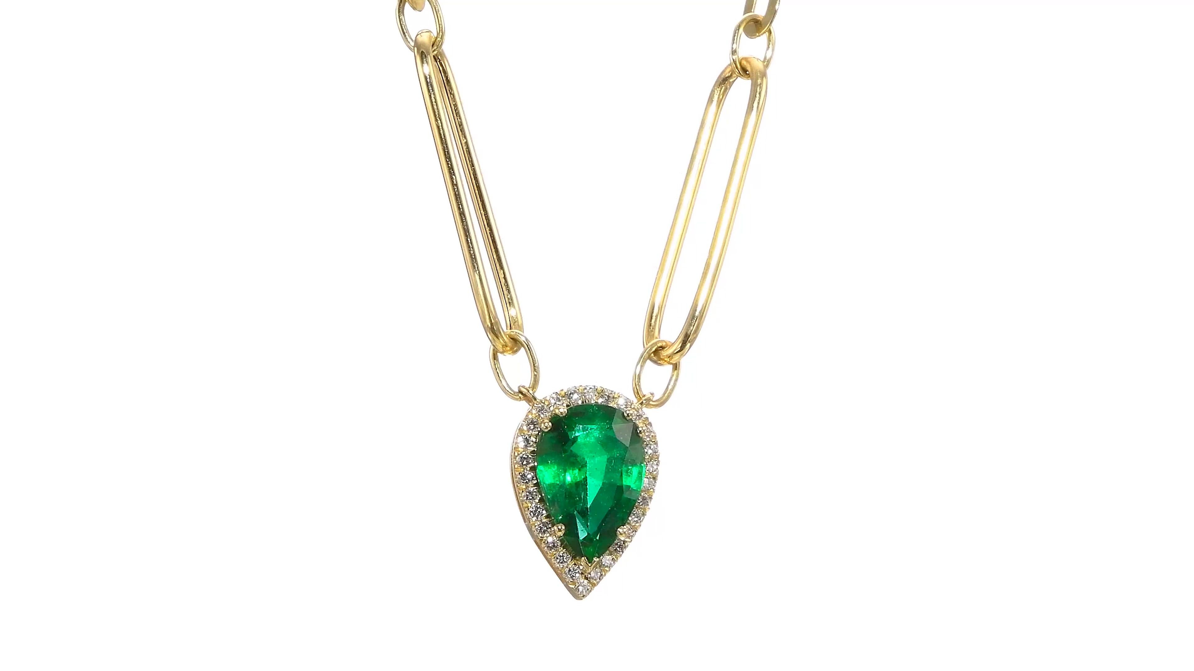 Our perfect Cut GIA certified alluring Emerald necklace will get you compliments anywhere you go.   The memorizing emerald is mounted on 14K Yellow gold and graced with 30 round cut diamonds totaling 0.26 Carat E-F/ VS. 
The pendent is hanging on a