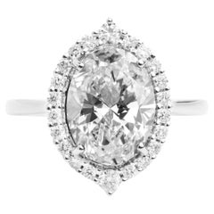 Bague de fiançailles en or blanc 18 carats avec halo de diamants ovales de 3,5 ct certifiés par la GIA