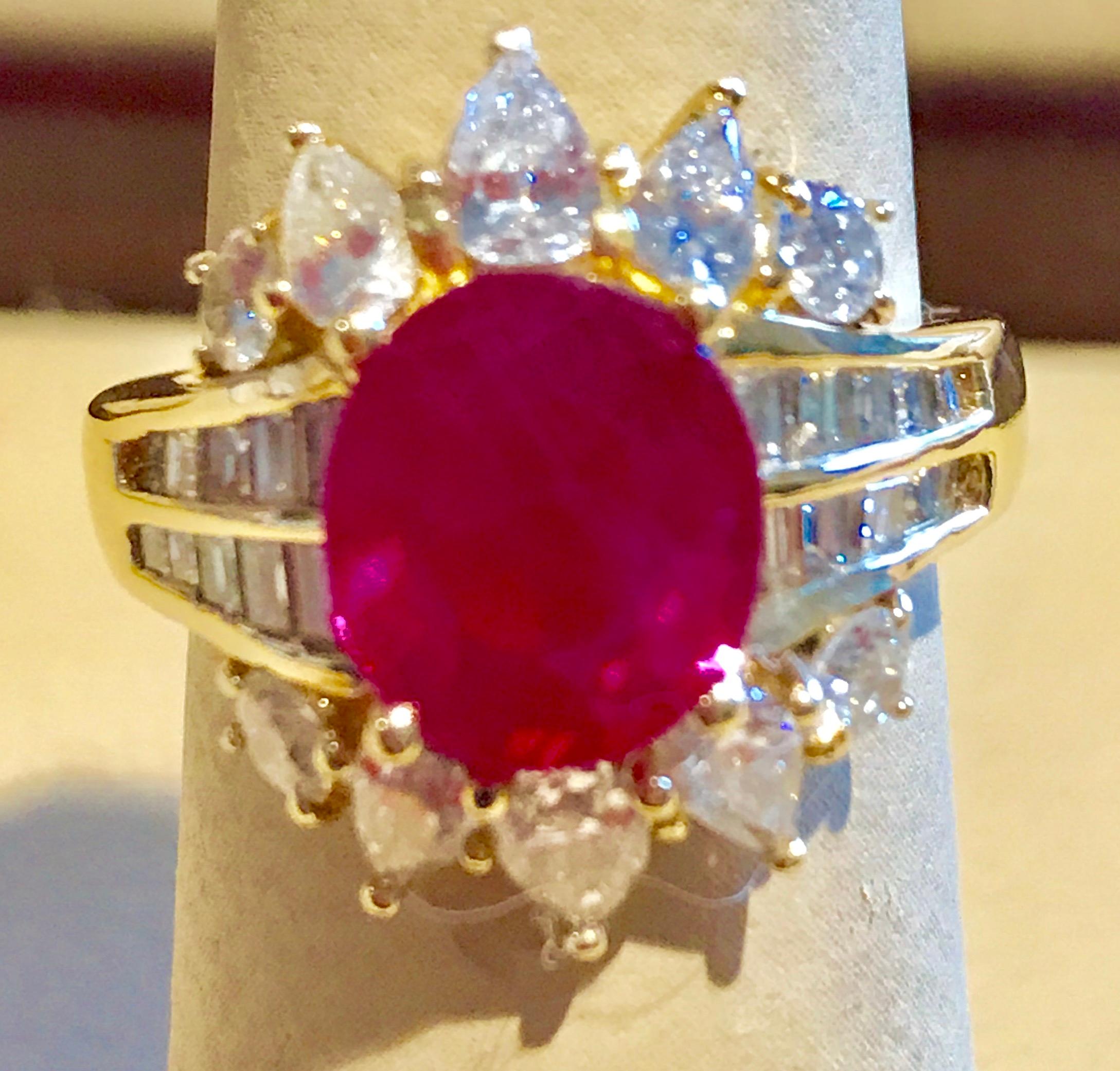 A classic, Cocktail ring 
3.6 Carat of very clean natural GIA Certified Burma Ruby and Diamond Ring
GIA report 3215496405
Burma Ruby is Minor Heat 
Gold: 10 Gm Yellow gold 
Diamonds: approximate 2.2 Carat , 8 diamonds are making a flower around the