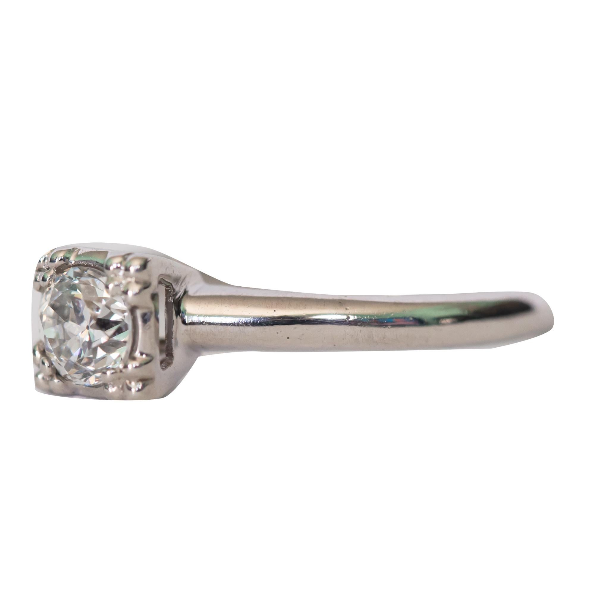 Ring Size: 6.25
Metal Type: Platinum [Hallmarked, and Tested]
Weight:  2.25 grams

Center Diamond Details:
GIA REPORT #5202058614
Weight: .36 carat
Cut: Old European Brilliant
Color: G
Clarity: SI1
Finger to Top of Stone Measurement: 5.5
Condition: 