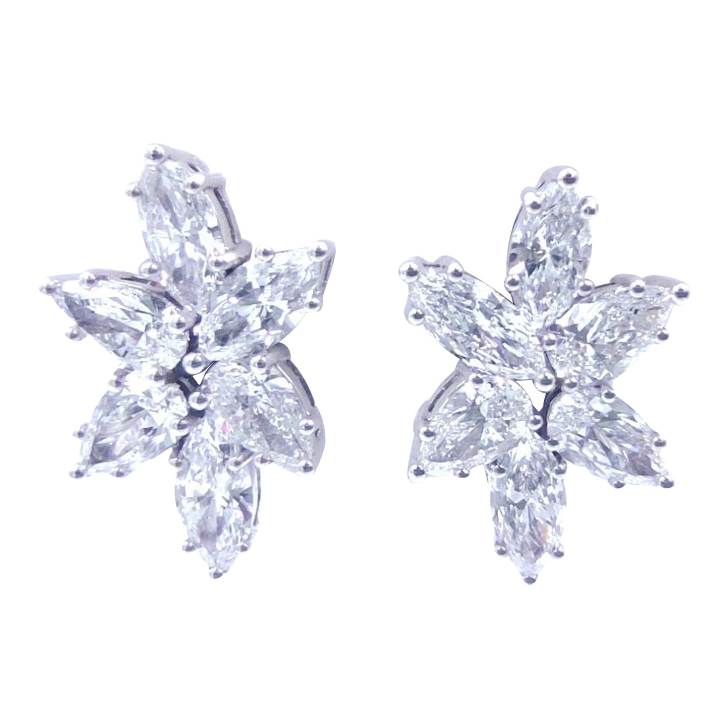 Behold the Original Antinori di Sanpietro Lever-Back Earrings, lovingly handcrafted in the heart of Italy. Crafted from the purest 18k white gold, these timeless jewels are adorned with a dazzling ensemble of 12 pear and marquise diamonds, each one