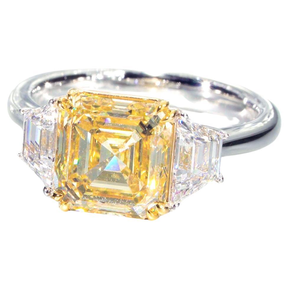 GIA Certified, 3.60ct Natural Fancy Yellow Emerald Shape Solitaire diamond  ring