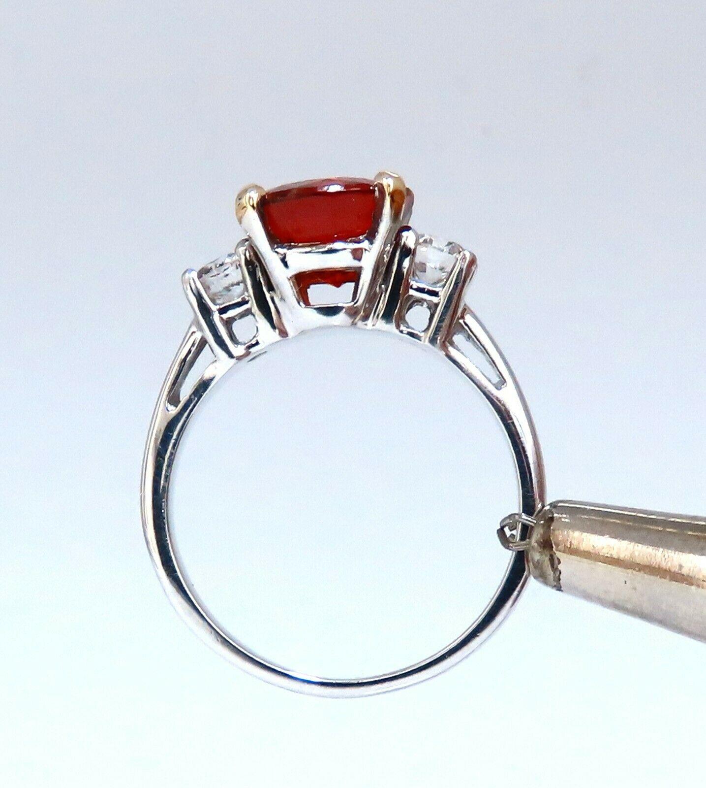 Spessartite Three Stone Statement

GIA 3.60ct. Natural Red-Orange Spessartite & .50ct. diamonds ring.

GIA Certified Report ID: 7356608656

9.51 X 8.62 X 5.22mm

Full cut oval brilliant 

Clean Clarity & Transparent

.50ct. Round (2)