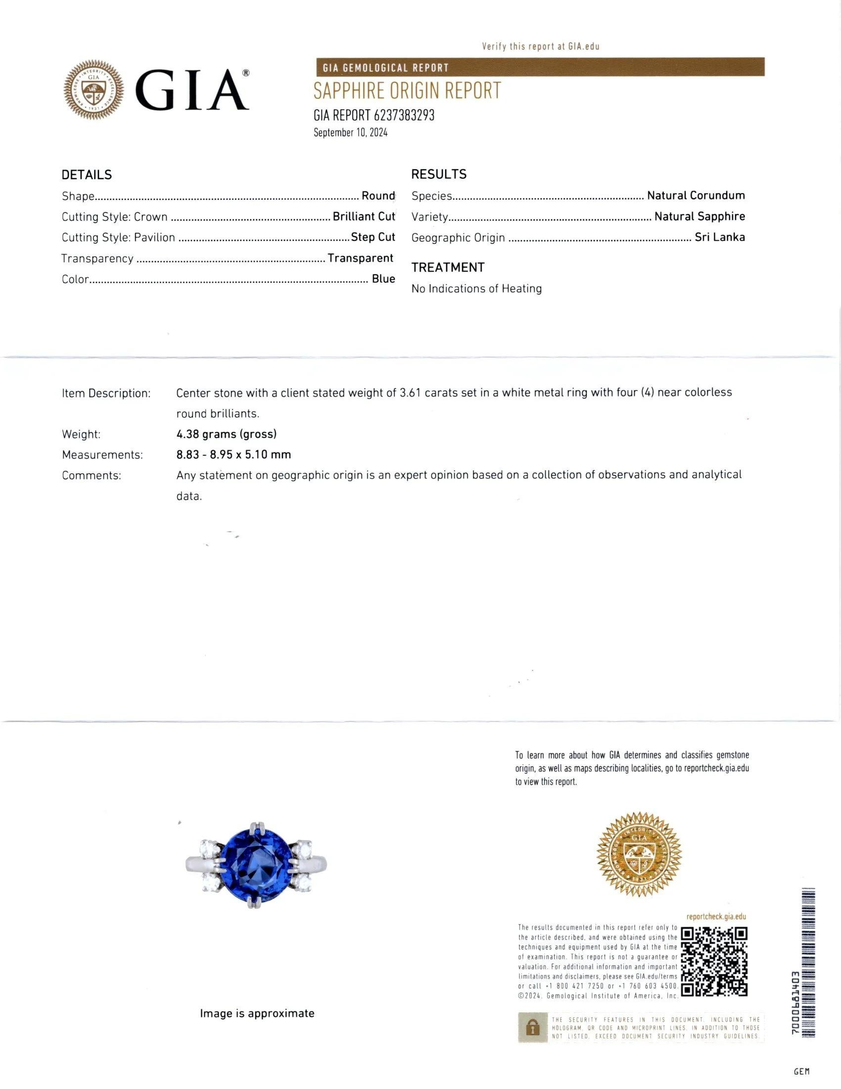 This refined platinum cocktail ring showcases a stunning GIA-certified 3.61 carat round sapphire from Sri Lanka, prized for its richly saturated cornflower blue hue. The center stone displays vivid color, exceptional brilliance, and remarkable