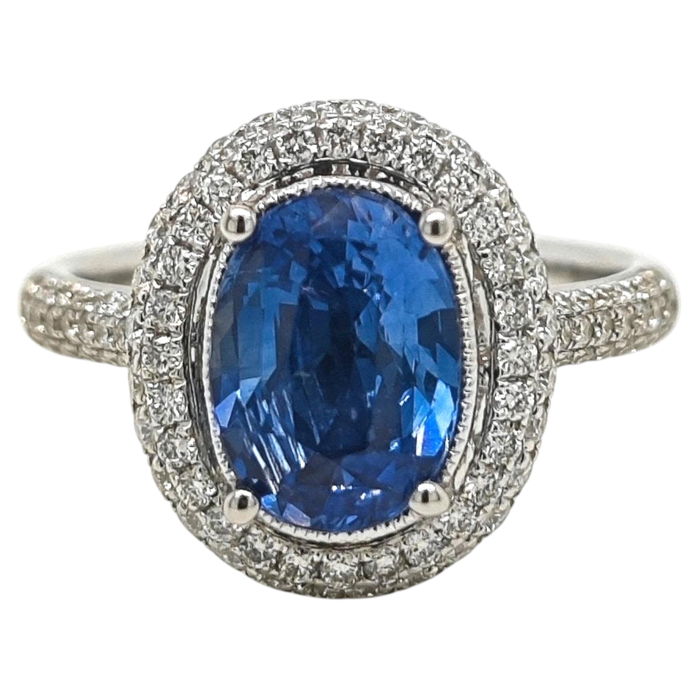 Bague en or blanc certifiée GIA de 3.65 carat de saphir et de diamant rond